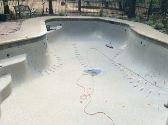 how to repair a crack in a gunite pool